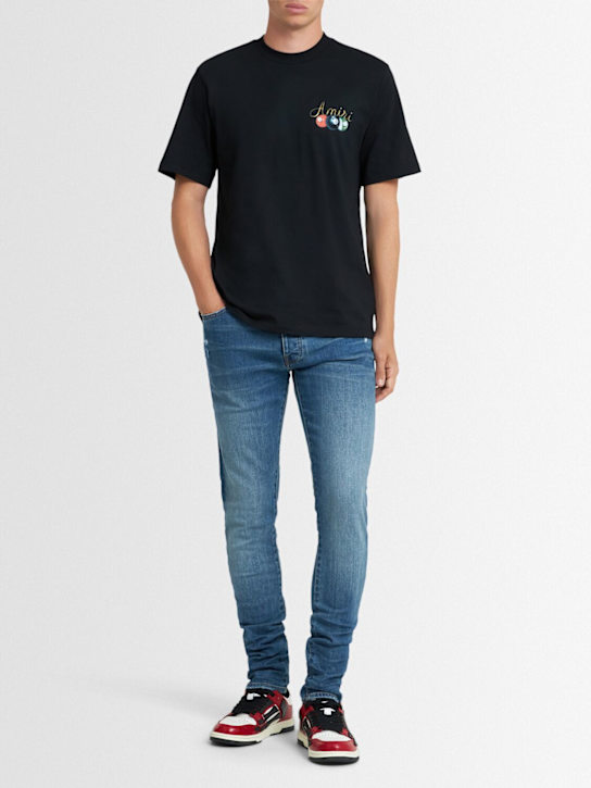 Amiri: 15cm Stack cotton denim jeans - Dark Indigo - men_1 | Luisa Via Roma