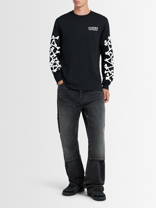 Amiri: Carpenter skinny jeans - men_1 | Luisa Via Roma