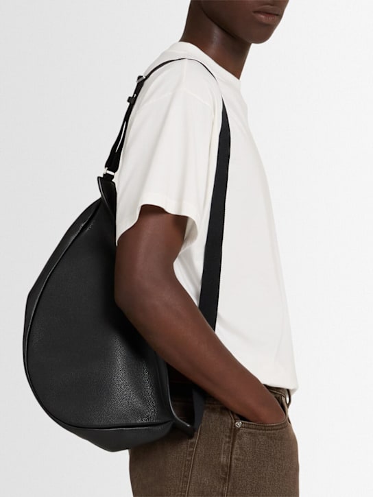 The Row: Large slouchy banana leather bag - Black Ans - men_1 | Luisa Via Roma