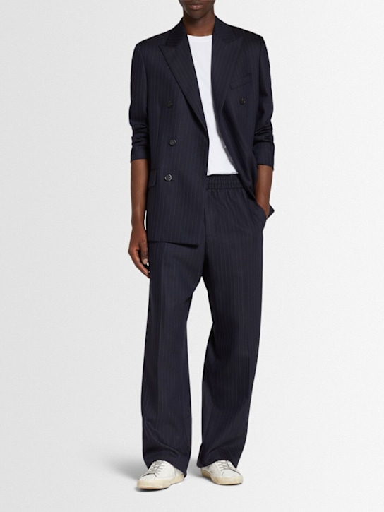 Golden Goose: Journey pinstripe wool blend wide pants - men_1 | Luisa Via Roma