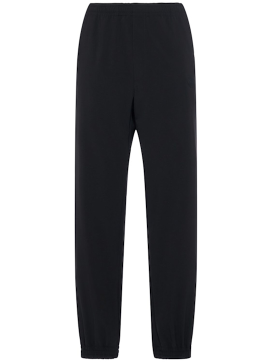 Moncler: Logo tech sweatpants - Black - men_0 | Luisa Via Roma