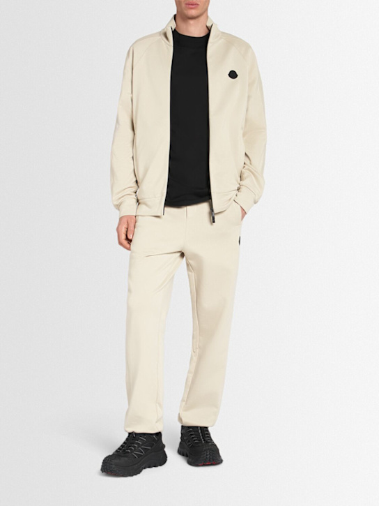Moncler: Logo cotton sweatpants - men_1 | Luisa Via Roma