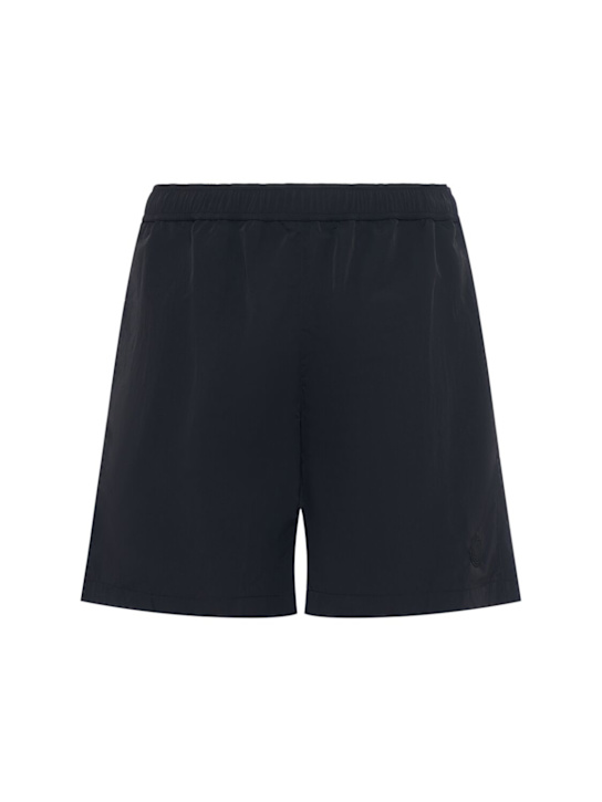 Moncler: Logo patch nylon swim shorts - Black - men_0 | Luisa Via Roma