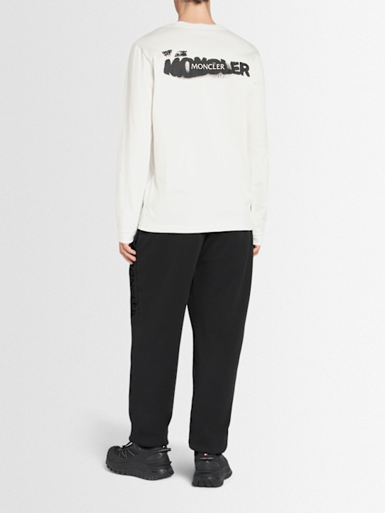 Moncler: Graphic logo long sleeve cotton t-shirt - men_1 | Luisa Via Roma
