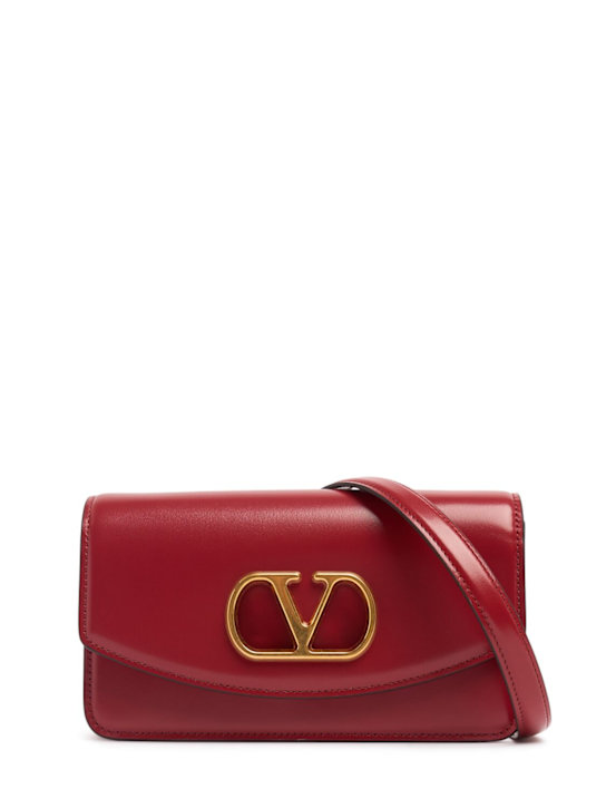 Valentino Garavani: Small shiny leather clutch - women_0 | Luisa Via Roma