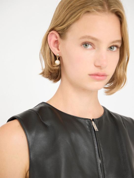 McQueen: Skull brass earrings - Gold - women_1 | Luisa Via Roma