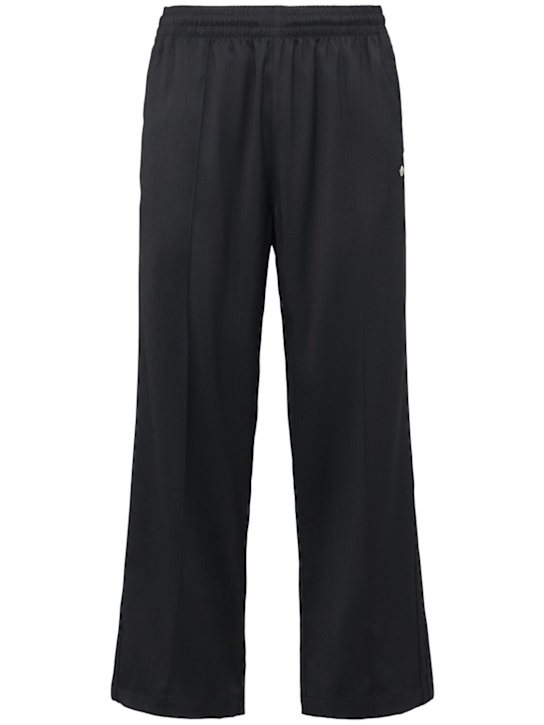 adidas Originals: Baggy track pants - Black - men_0 | Luisa Via Roma
