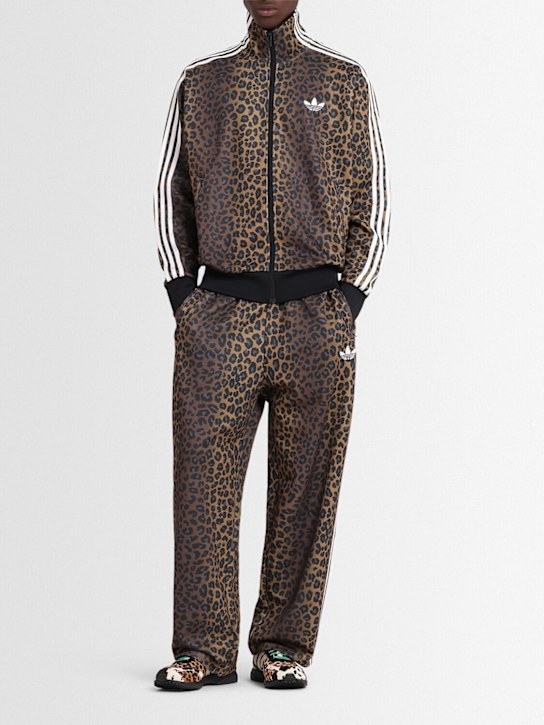 adidas Originals: Firebird track pants - men_1 | Luisa Via Roma