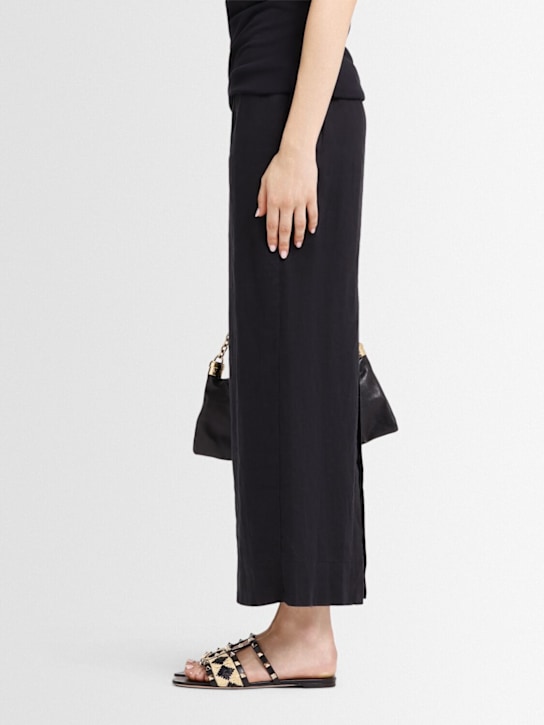 Valentino Garavani: 10mm Rockstud leather & raffia sandals - Black - women_1 | Luisa Via Roma