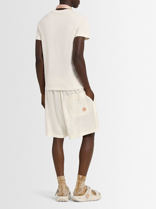Moncler Genius: Moncler x Gilga Farm linen blend shorts - White - men_1 | Luisa Via Roma