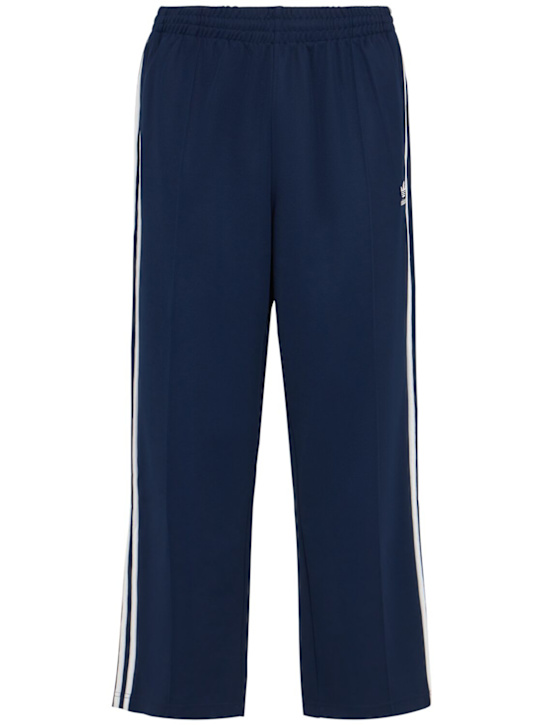 adidas Originals: Baggy track pants - men_0 | Luisa Via Roma