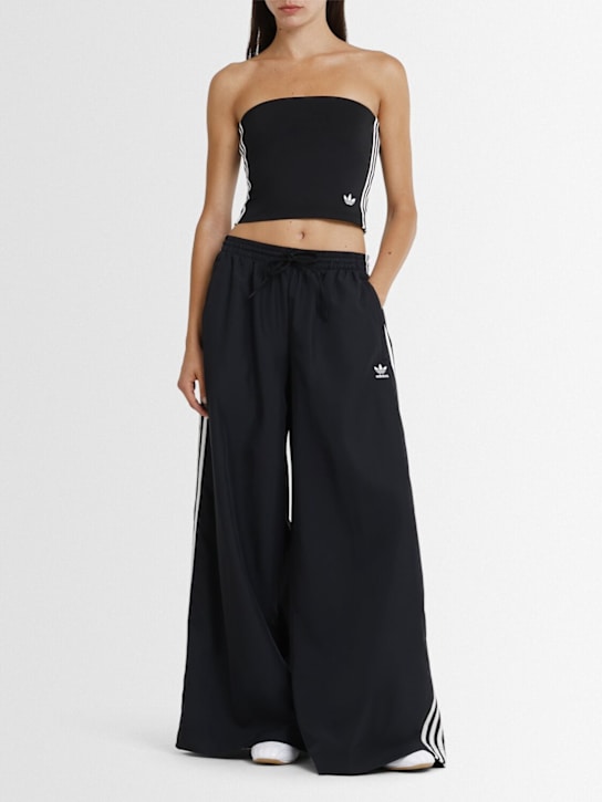 adidas Originals: Oversized track pants - Black - women_1 | Luisa Via Roma