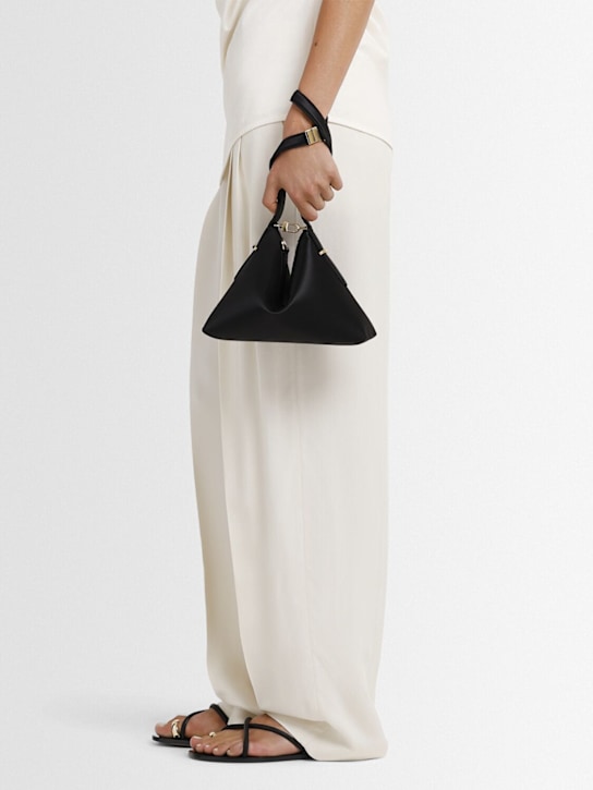Toteme: Satin scoop wristlet - Black - women_1 | Luisa Via Roma