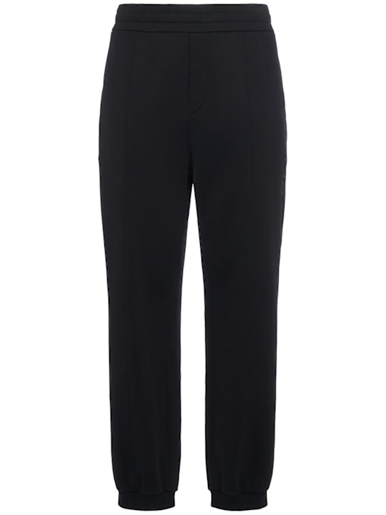 Moncler: Logo cotton sweatpants - Black - men_0 | Luisa Via Roma