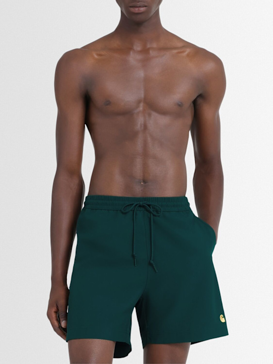 Carhartt WIP: Chase swim shorts - Dark Fir/Gold - men_1 | Luisa Via Roma