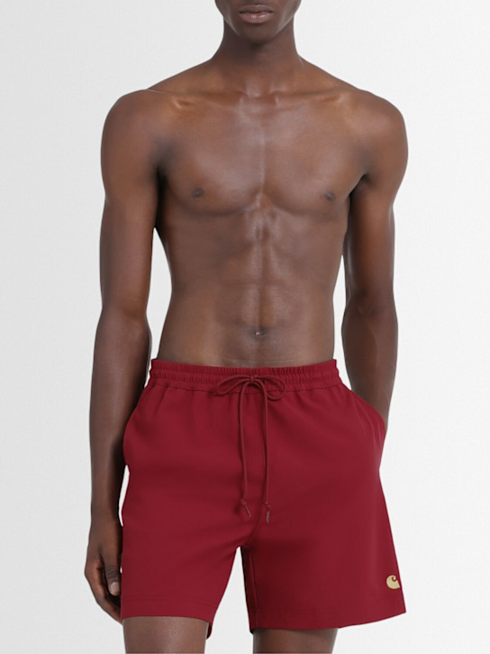 Carhartt WIP: Chase swim shorts - Scarlet/Gold - men_1 | Luisa Via Roma