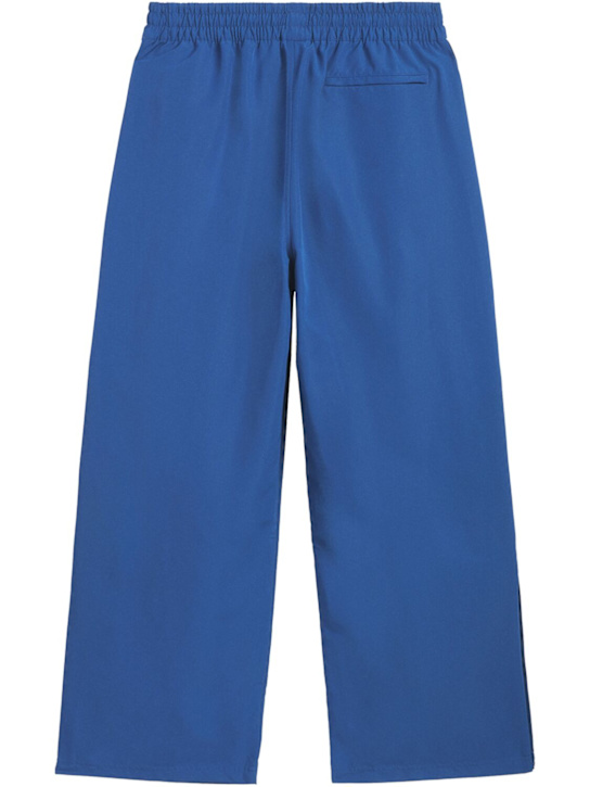 adidas Originals: Chavarria woven track pants - men_1 | Luisa Via Roma