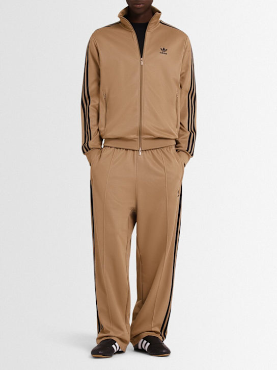 adidas Originals: Baggy track pants - Cardboard - men_1 | Luisa Via Roma