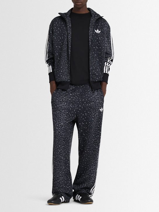 adidas Originals: Firebird track pants - men_1 | Luisa Via Roma