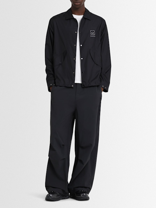 adidas Originals: Parachute pants - Black - men_1 | Luisa Via Roma