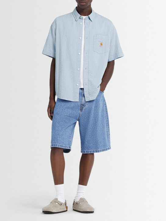 Carhartt WIP: Kurzes, ämelloses Polohemd „Toland“ - Blue Fog - men_1 | Luisa Via Roma