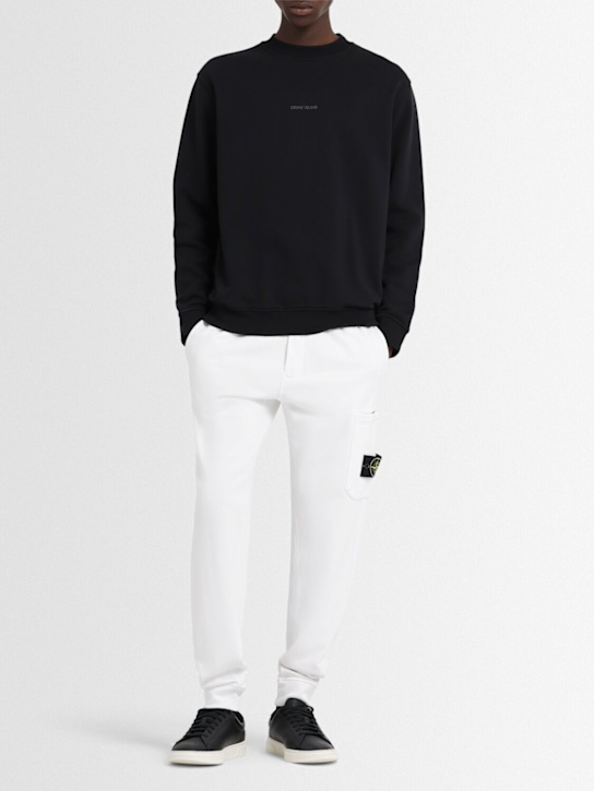 Stone Island: Pantalones de felpa de algodón - Blanco - men_1 | Luisa Via Roma