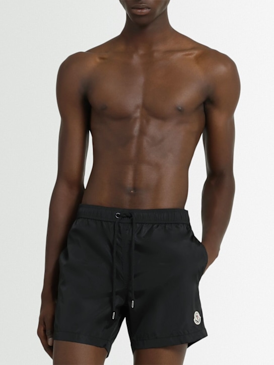 Moncler: Logo patch nylon swim shorts - Black - men_1 | Luisa Via Roma