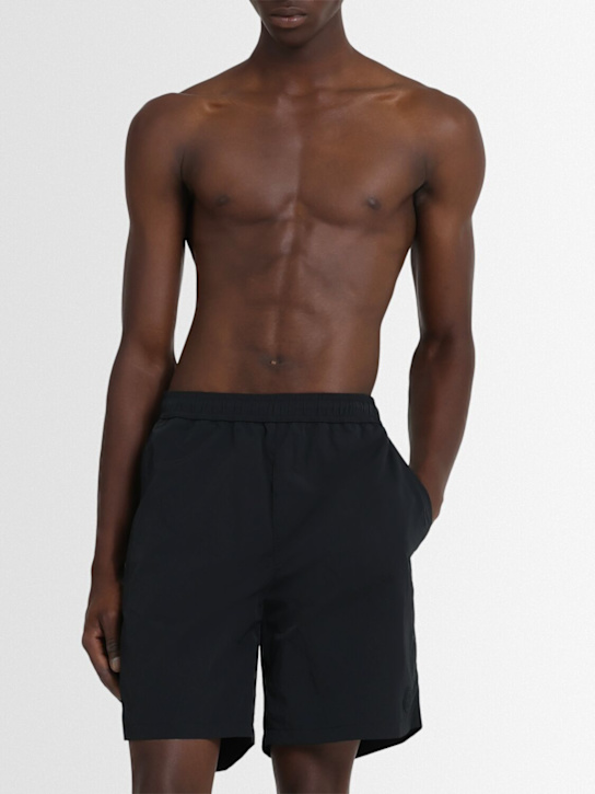 Moncler: Logo patch nylon swim shorts - Black - men_1 | Luisa Via Roma