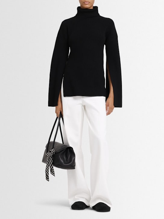 Toteme: Slit sleeve wool knit turtleneck sweater - Black - women_1 | Luisa Via Roma