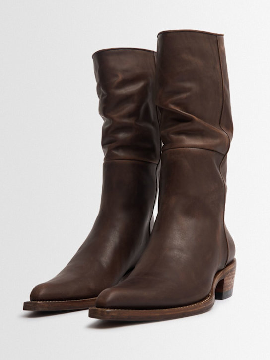Khaite: 25 Clive slouchy cowboy boots - women_1 | Luisa Via Roma