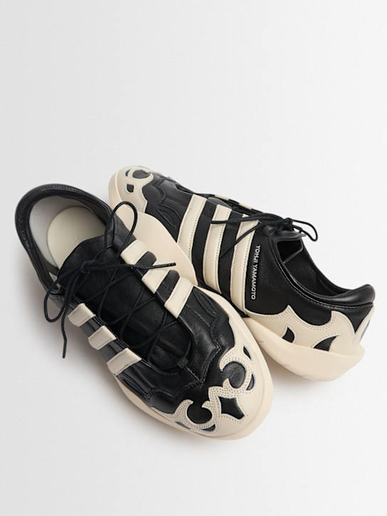 Y-3: Regu 2002 leather sneakers - men_1 | Luisa Via Roma