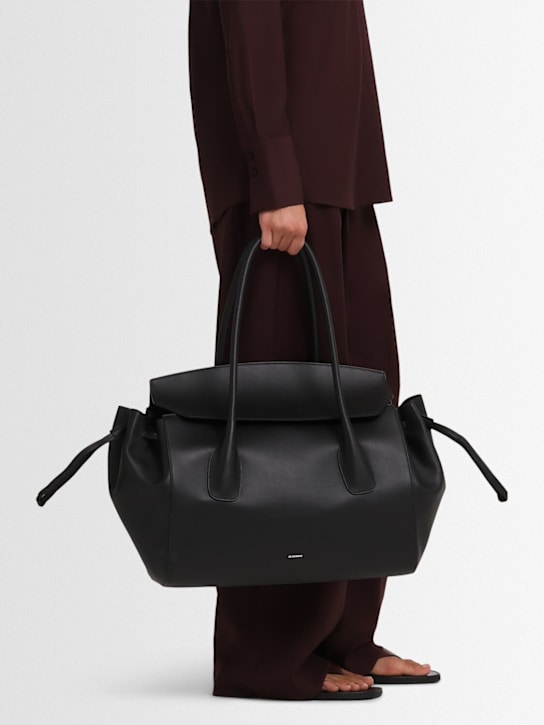 Jil Sander: Medium Voyage soft leather bag - Black - women_1 | Luisa Via Roma