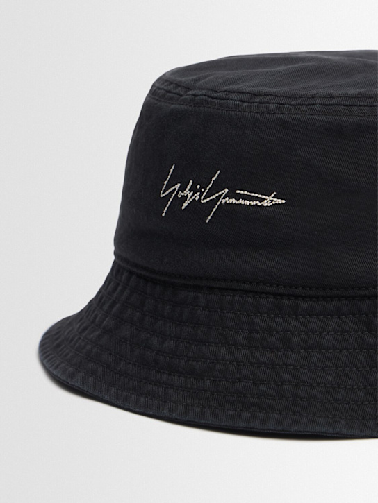 Yohji Yamamoto: Y-3 Kuro bucket hat - Black - men_1 | Luisa Via Roma