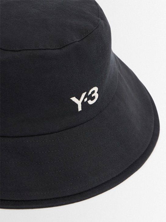 Y-3: 3 Stripes cotton bucket hat - Black - men_1 | Luisa Via Roma