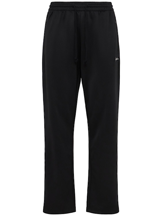 Yohji Yamamoto: Y-3 Kuro track pants - Black - men_0 | Luisa Via Roma