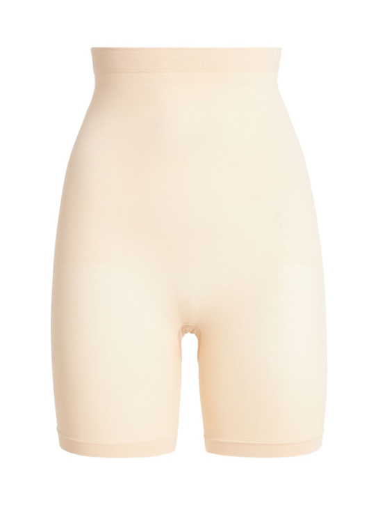 Skims: Seamless Sculpt mid-thigh shorts - Sand - women_0 | Luisa Via Roma