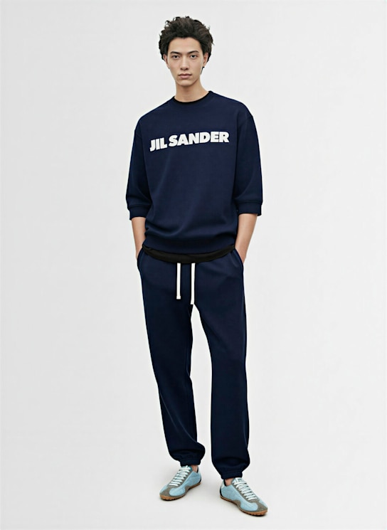 Jil Sander: Compact cotton terry sweatpants - ブルー - men_1 | Luisa Via Roma