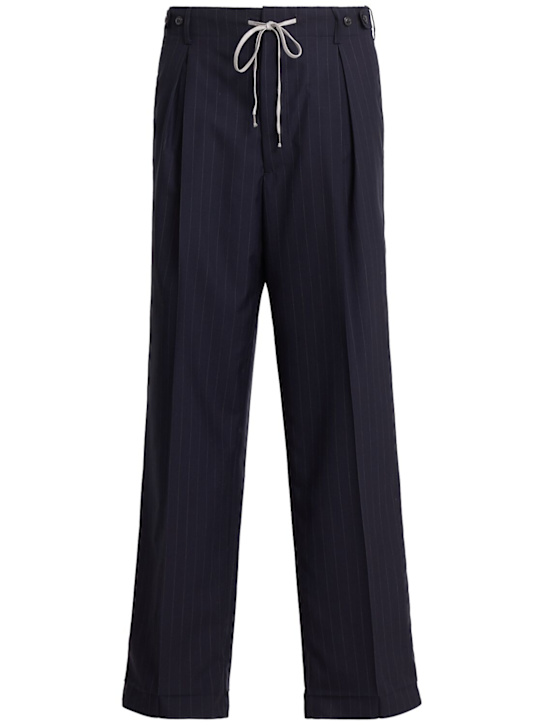 Maison Margiela: Pinstriped wool pants - men_0 | Luisa Via Roma