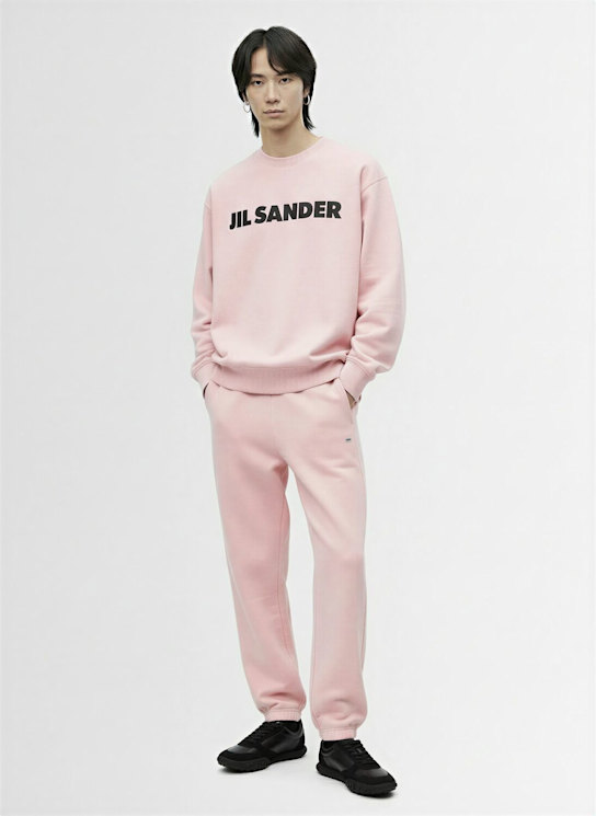 Jil Sander: Compact cotton terry sweatpants - Pink - men_1 | Luisa Via Roma