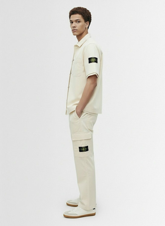 Stone Island: Stretch cotton twill pants - アイボリー - men_1 | Luisa Via Roma