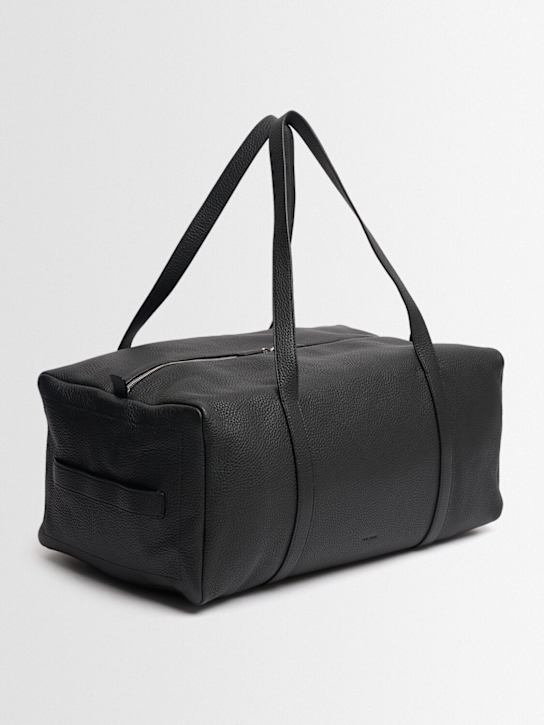 The Row: Gio leather duffle bag - Black Ans - men_1 | Luisa Via Roma