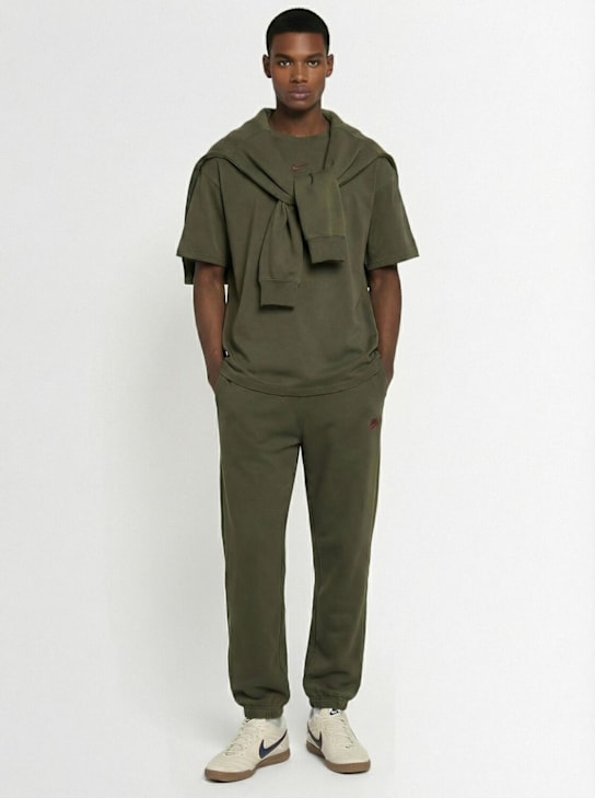 Nike: Pantaloni Nocta in misto cotone - Verde - men_1 | Luisa Via Roma