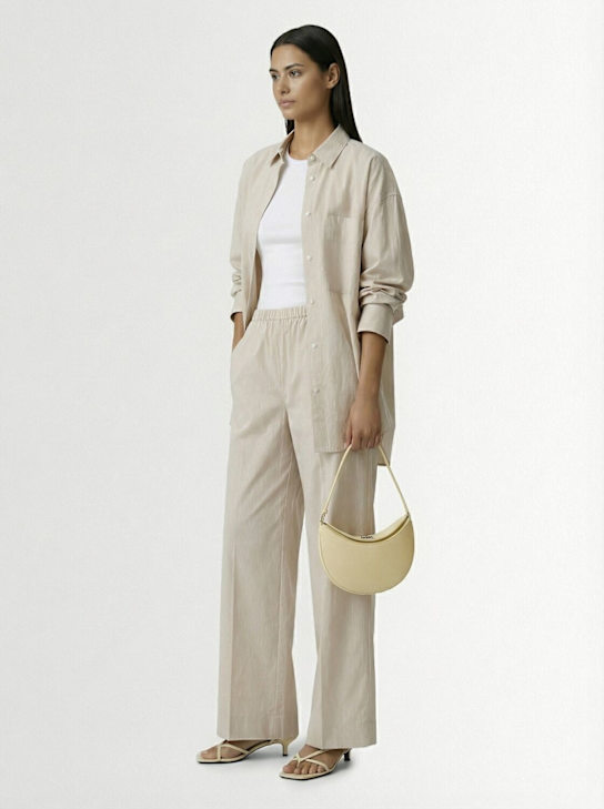 Jacquemus: Le Petit Calisso Rond皮革单肩包 - Dusty Yellow - women_1 | Luisa Via Roma
