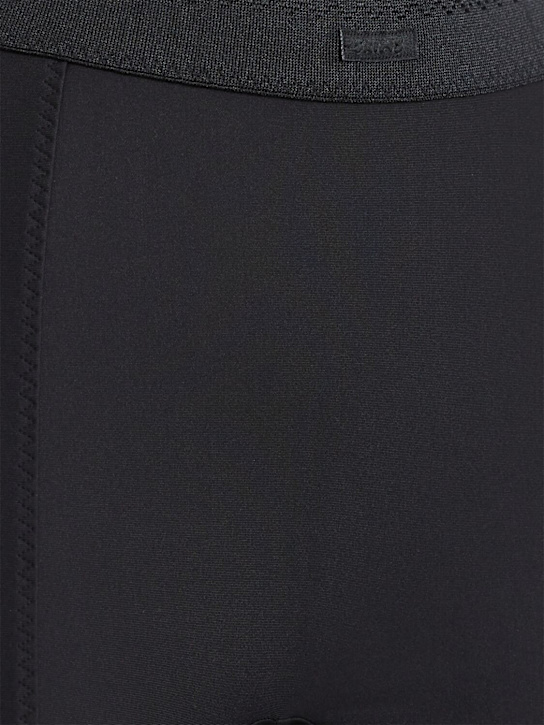 Skims: High waist flared leggings - Ónix - women_1 | Luisa Via Roma