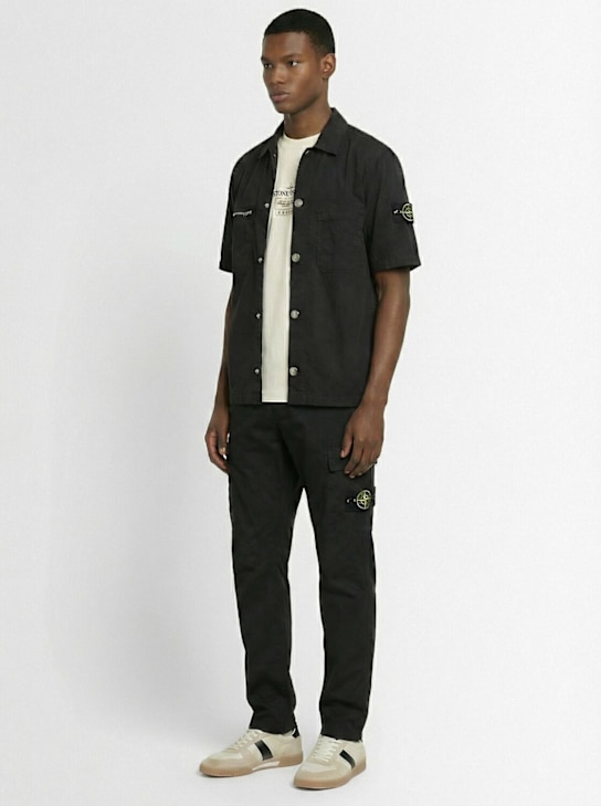 Stone Island: Stretch cotton twill pants - ブラック - men_1 | Luisa Via Roma