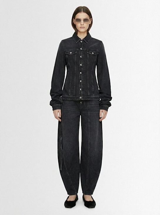 Jean Paul Gaultier: Low waisted denim jeans w/ strap detail - Black - women_1 | Luisa Via Roma