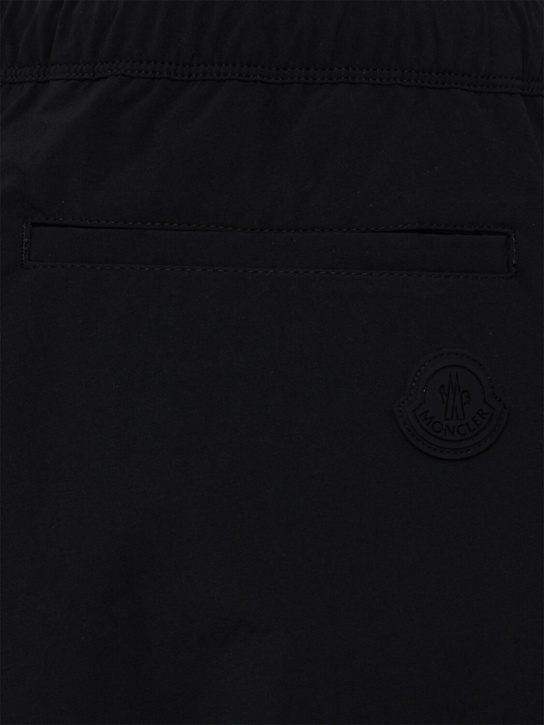 Moncler: Logo nylon track pants - 黑色 - men_1 | Luisa Via Roma