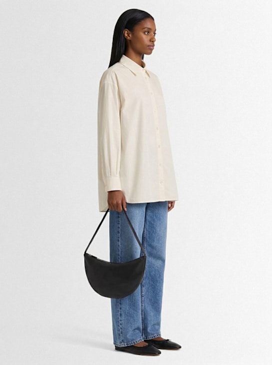 The Row: Small izzy light leather shoulder bag - Black - women_1 | Luisa Via Roma