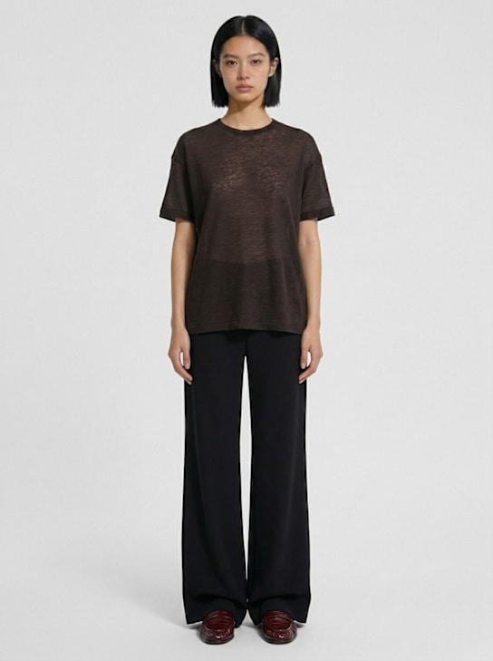 The Row: Galen crepe georgette wide pants - Black - women_1 | Luisa Via Roma