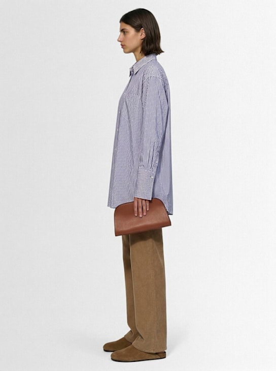 The Row: Peggy saddle leather clutch - women_1 | Luisa Via Roma